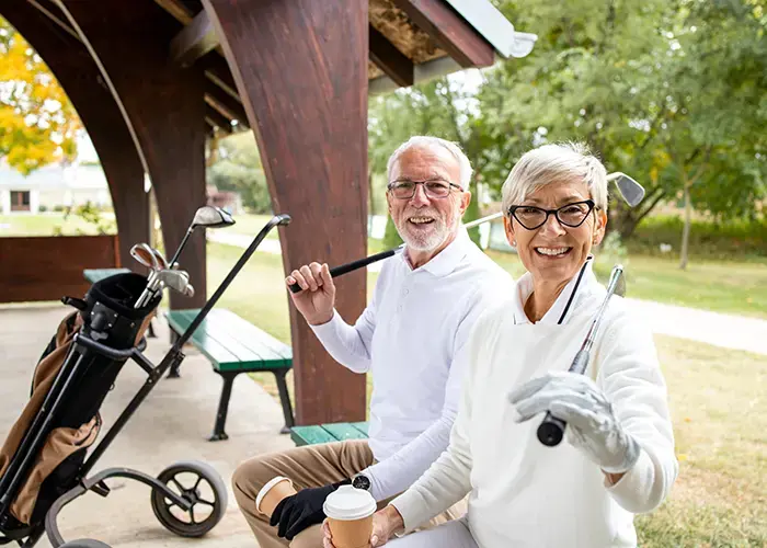 Older couple at golf course