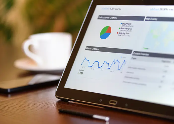 Tablet showing statistics and graphs related to retirement